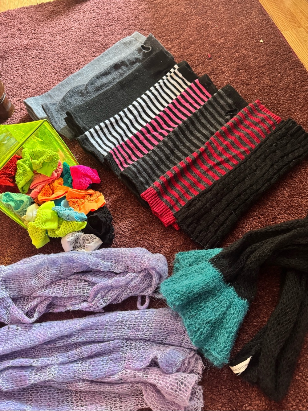 Assorted fingerless gloves and sleeves and reversible scarves/sleeves